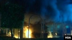 The U.S. Consulate in Benghazi, Libya burns during a September 2012 attack that killed the U.S. Ambassador and three others. 