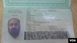 A photo shows a Pakistani passport and ID card that Mullah Akhtar Mansoor was allegedly carrying, although questions are being asked how the documents could have survived the drone strike.
