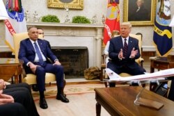 President Donald Trump meets with Iraqi Prime Minister Mustafa Kadhimi in the Oval Office of the White House, Aug. 20, 2020, in Washington.