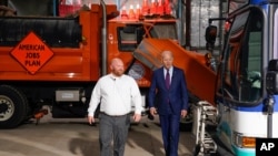 President Joe Biden participates in a tour of the La Crosse Municipal Transit Authority with Adam Lorentz, Transit Manager, La Crosse Municipal Transit Utility, June 29, 2021, in La Crosse, Wis. 