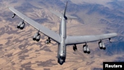 File - A B-52 Stratofortress is shown over Afghanistan in this undated handout photo.