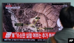 FILE - A man watches a TV news program on North Korea conducting a nuclear test, at Seoul Railway Station in Seoul, South Korea, Sept. 9, 2016.