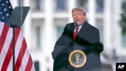 FILE - President Donald Trump speaks during a rally protesting the electoral college certification of Joe Biden as President in Washington, Jan. 6, 2021. 
