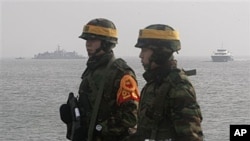 South Korean marines stand guard on Yeonpyeong Island, South Korea, Dec. 17, 2010