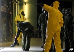 A hazmat crew scans the decontamination zone at Kuala Lumpur International Airport 2 in Sepang, Malaysia, Feb. 26, 2017.