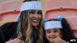 Fans arrive for the FIFA Club World Cup 2023 football final match between England's Manchester City and Brazil's Fluminense at King Abdullah Sports City Stadium in Jeddah on December 22, 2023. (Photo by Giuseppe CACACE / AFP)