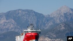 FILE - Turkey's exploratory vessel, the Oruc Reis, is seen anchored in the Mediterranean, off the coast of Antalya, Turkey, July 24, 2020.