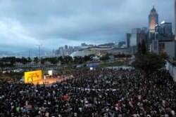 Workers from the medical and health care sector take part in a demonstration in Hong Kong, Aug. 2, 2019.