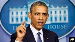President Barack Obama speaks in the Brady Press Briefing Room of the White House in Washington, Aug. 1, 2014.