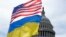 Американський та український прапори майорять біля Капітолія у Вашингтоні, США, 23 квітня 2024 року. AP Photo/Mariam Zuhaib