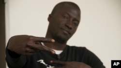 Senegalese hip-hop artist Red Black. His song, "Na Dem," has become an opposition anthem in the country's presidential elections.
