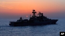 FILE - The Russian navy destroyer Vice Admiral Kulakov is seen on patrol in the eastern Mediterranean. Xinhua said the theme of this year's drills was "joint rescue and protection of maritime economic activities".