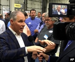 EPA Administrator Scott Pruitt, talks to a reporter after speaking at Whayne Supply in Hazard, Kentucky, Oct. 9, 2017.