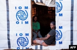 Displaced Oromos sit in a temporary shelter at Banco Chelchele site in West Guji, Ethiopia, July 31, 2018.