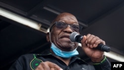 Former South African president Jacob Zuma addresses his supporters in front of his rural home in Nkandla on July 4, 2021, for the first time since he was given a 15-months sentence for contempt of court.