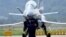 FILE - A Chinese J-10 fighter jet is being guided on the tarmac following a flight demonstration at China's 13th International Aviation and Aerospace Exhibition, in Zhuhai, in southern China's Guangdong province, Sept. 28, 2021. 