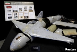 Remains of Iranian drones provided by the Pentagon are on display before U.S. Ambassador to the United Nations Nikki Haley briefs the media on highlights of the U.N.'s 2231 Implementation Report at Joint Base Anacostia-Bolling in Washington, Dec. 14, 2017.