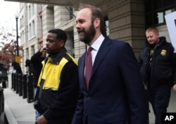 Rick Gates leaves federal court in Washington, Feb. 23, 2018. Gates is a former top adviser to President Donald Trump's election campaign.