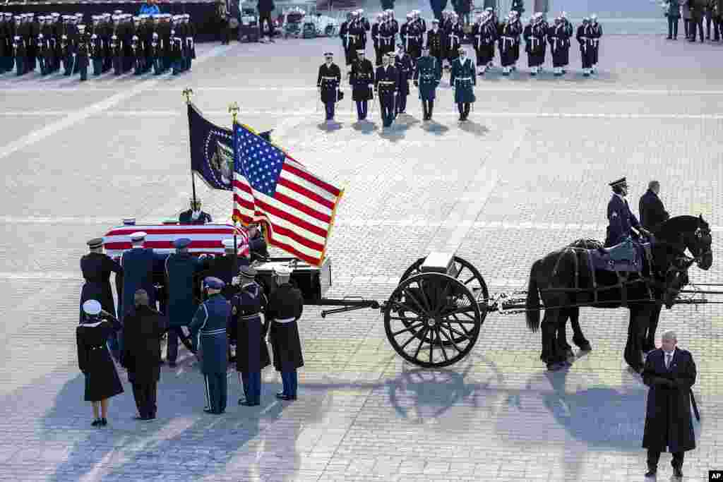 The casket of former President Jimmy Carter arrives on a horse-drawn caisson at the East Front of U.S. Capitol in Washington, Jan. 7, 2025. 