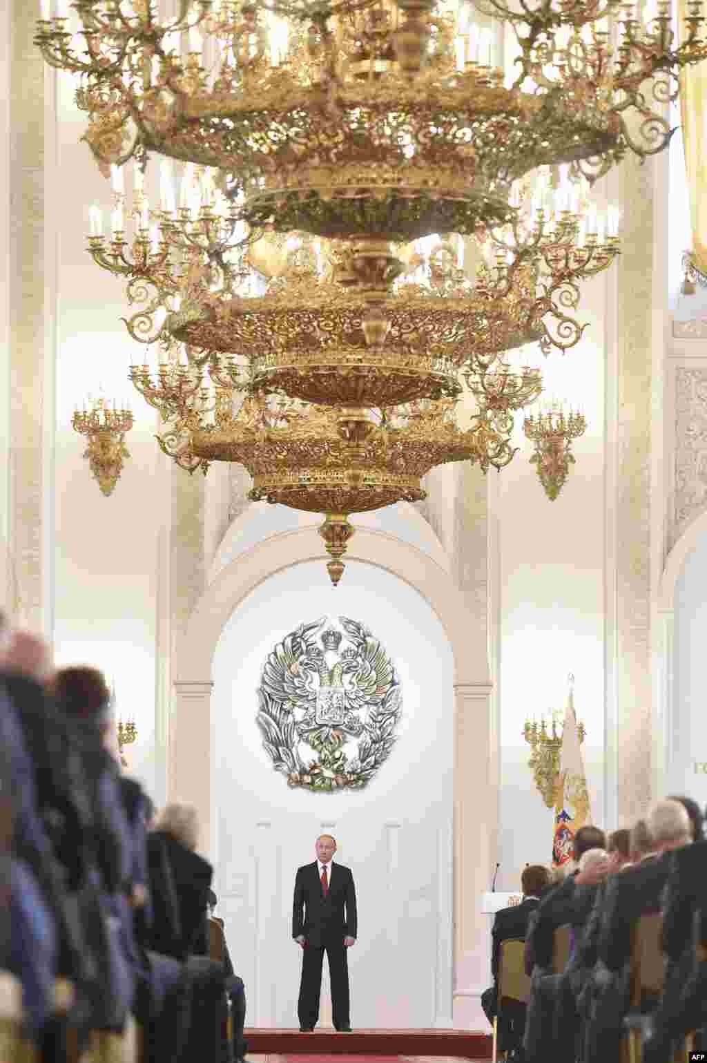 Presiden Rusia Vladimir Putin pada peringatan 'Hari Rusia' di Istana Kremlin, Moskow.