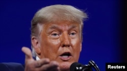 FILE - Former U.S. President Donald Trump speaks at the Conservative Political Action Conference in Orlando, Fla., Feb. 28, 2021.