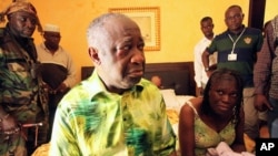 Former Ivorian President Laurent Gbagbo and his wife Simone, in the custody of forces loyal to Alassane Ouattara at the Golf Hotel in Abidjan, Ivory Coast, April 11, 2011