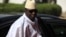 FILE - Gambia's President Yahya Jammeh in Abuja, Nigeria, February 2014.