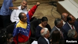Pro-government lawmakers attend a session of Venezuela's National Assembly in Caracas, Venezuela, Sept. 24, 2019.