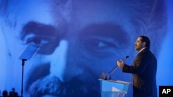 FILE - Lebanese Prime Minister Saad Hariri speaks during a ceremony to mark the 12th anniversary of the assassination of his father, former Prime Minister Rafik Hariri, in a massive truck bombing, in Beirut, Lebanon, Feb. 14, 2017.