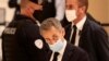 Former French President Nicolas Sarkozy arrives at the courtroom, Nov. 23, 2020 in Paris. 