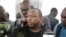 Nairobi governor Mike Gideon Mbuvi appears with other suspects accused of corruption, at the Mililani law court in Nairobi, Kenya, Dec. 9, 2019.