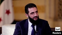 Rêberê HTŞ Ehmed el Şeri' (Ebû Mihemed el Jolanî).