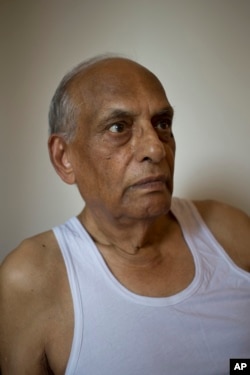 Sohinder Nath Chopra, 81, sits inside his house in New Delhi, India, Aug. 2, 2017. Chopra still has vivid dreams of his old village near Gujranwala in present day Pakistan. A village he and his Hindu family had to flee overnight, guarded by their Christian servant.