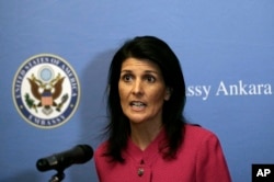 FILE - U.S. Ambassador to the U.N. Nikki Haley speaks to the staff at the U.S. Embassy in Ankara, Turkey, May 23, 2017.