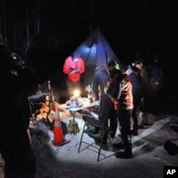 Competitors at Ski Pulk, the last checkpoint, 110 miles (177 km) into the race.