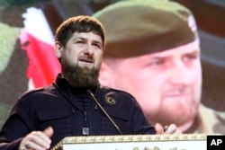 FILE - Chechen regional leader Ramzan Kadyrov speaks as he attends celebrations marking Defenders of the Fatherland Day in Chechnya's provincial capital Grozny, Russia, Feb. 20, 2016.