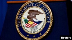 ཝ་ཤིང་ཊོན་དུ་རྟེན་གཞི་བྱས་ཡོད་པའི་ཨ་རིའི་ཁྲིམས་འཛིན་ལྷན་ཁང་གི་ཐེལ་རྟགས།