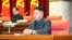 Lãnh tụ Bắc Triều Tiên Kim Jong Un tham dự một cuộc họp của đảng cầm quyền ở Bình Nhưỡng. Ảnh do Thông tấn xã Bắc Triều Tiên KCNA phát hành ngày 9/12/2013. 