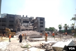 Some locals say the destruction of the unused building is a sign of progress, others complain it represents a time of unprecedented idealism in Egypt, Cairo, June 4, 2015. (H. El Rasam)