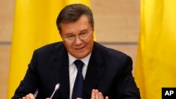 FILE - Ukraine's fugitive President Viktor Yanukovych is seen at a news conference in Rostov-on-Don, Russia, Feb. 28, 2014