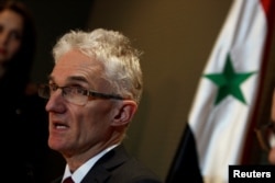 FILE - Mark Lowcock, U.N. undersecretary-general for humanitarian affairs and emergency relief coordinator, speaks during a news conference in Damascus, Syria, Jan. 11, 2018.