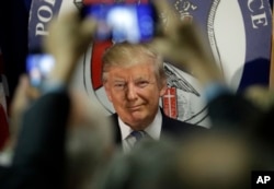 Republican presidential candidate Donald Trump meets with people after speaking at the Polish National Alliance in Chicago, Sept. 28, 2016.