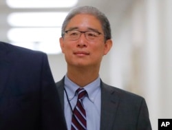 FILE - U.S. Justice Department official Bruce Ohr arrives for a closed hearing of the House Judiciary and House Oversight committees on Capitol Hill in Washington, Aug. 28, 2018.