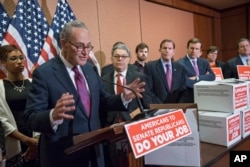From left, Sen. Charles Schumer, D-N.Y., Sen. Al Franken, D-Minn., Sen. Richard Blumenthal, D-Conn., and Sen. Chris Murphy, D-Conn., criticize Republican leadership at a news conference on Capitol Hill in Washington, Feb. 24, 2016