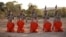 A screen shot from an Islamic State propaganda video purports to show young boys executing a group of captives.