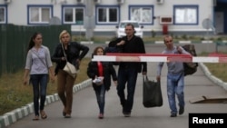 Українські біженці на кордоні з Росією