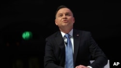FILE - Poland's President Andrzej Duda speaks at Central Hall Westminster in London, Dec. 3, 2019.