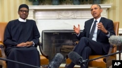 Presiden AS Barack Obama (kanan) saat menemui Presiden Nigeria Muhammadu Buhari,di Ruang Oval Gedung Putih (20/7). 