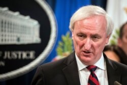 FILE - Deputy Attorney General Jeffrey Rosen speaks at the Justice Department in Washington, Nov. 5, 2019.