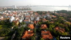 An aerial view shows West Lake and its surroundings in Hanoi, Dec. 18, 2014. 